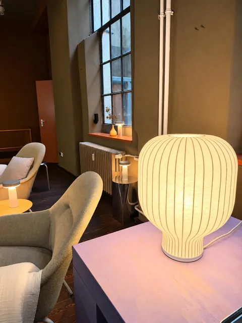 A lamp on the side table
