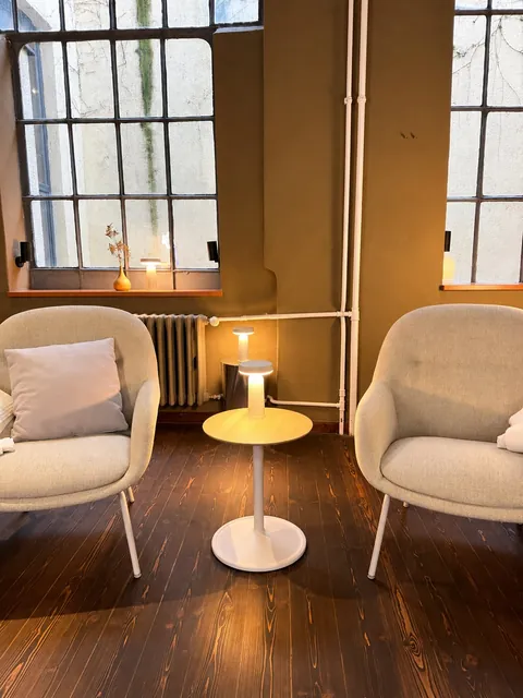 Two armchairs and a side table